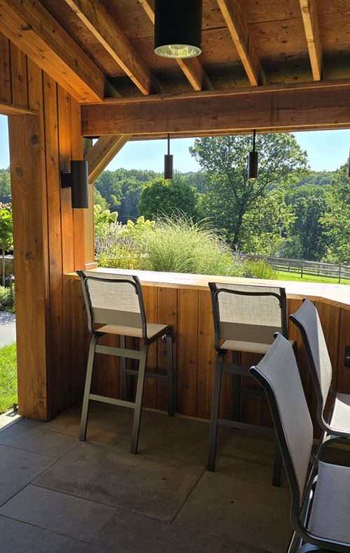 outdoor seating in barn poolhouse